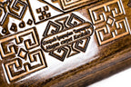 Lori Pambak Carpet Pattern backgammon board - playing pieces and dice arranged on the board