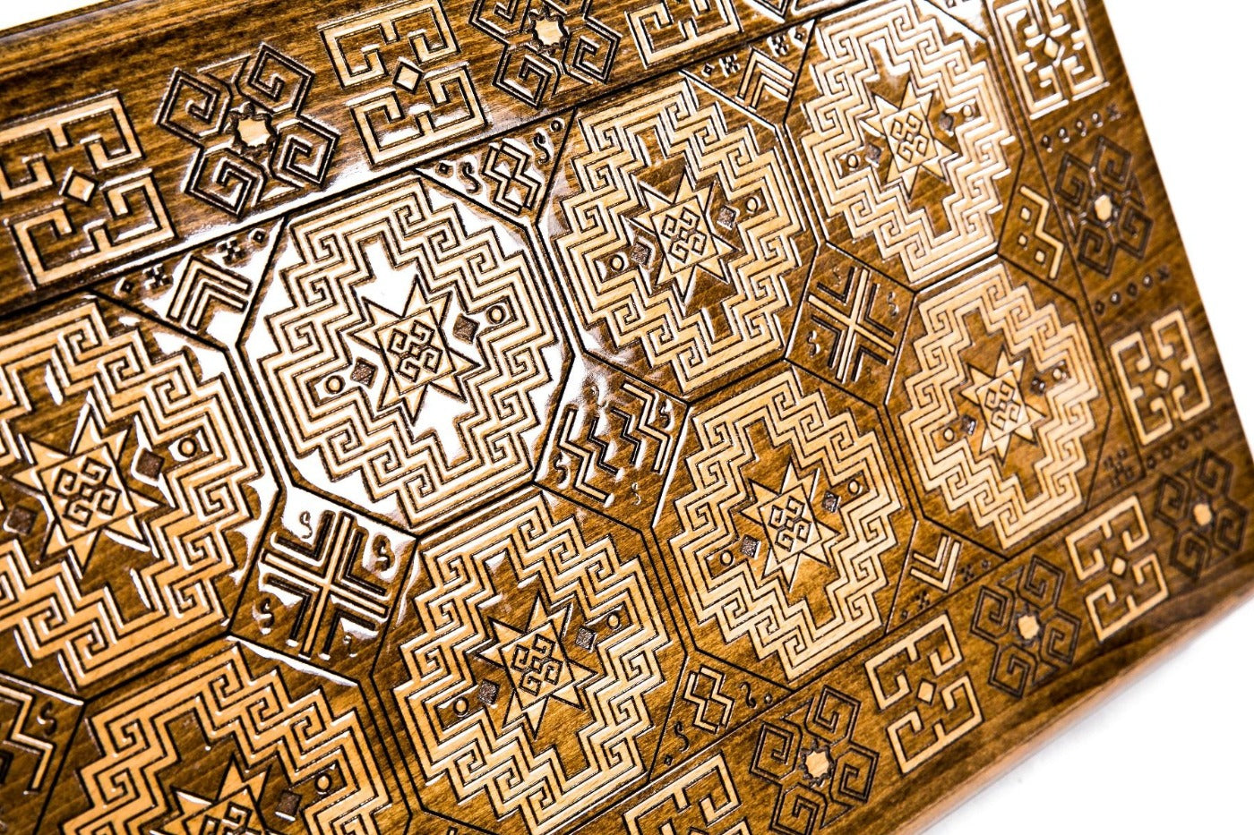 The interior view of the open Hrachya Ohanyan Pambak set highlighting the smooth wood finish and professional-grade pips.