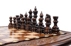 Carved Chess chess and backgammon set - close-up of hand-carved chess pieces