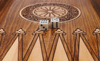 Handmade chess and backgammon set - close-up of hand-carved chess pieces