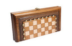 Closed 30 cm wooden chess set showing the carved frame and bronze coordinate studs