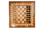 Ornamental Classic chess and backgammon set - close-up of hand-carved chess pieces