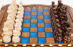 Classic Blue Epoxy chess and backgammon set - close-up of hand-carved chess pieces
