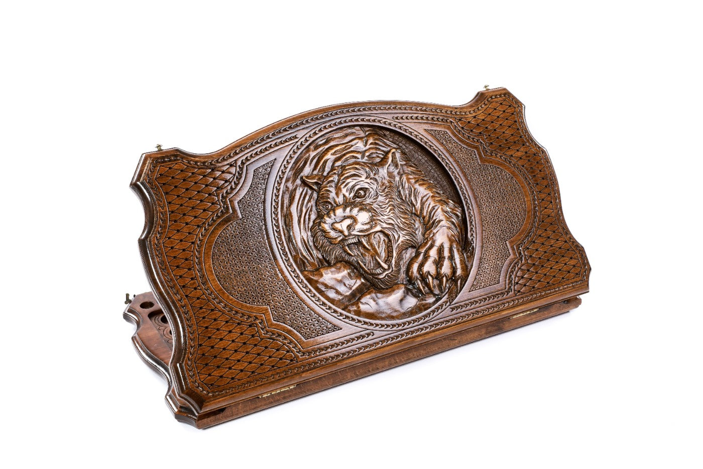 A frontal shot of the closed Tiger backgammon board showing the detailed feline relief within the copyrighted contour outline.
