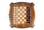 Top-down view of the contour outline chess set with all 32 pieces in starting position