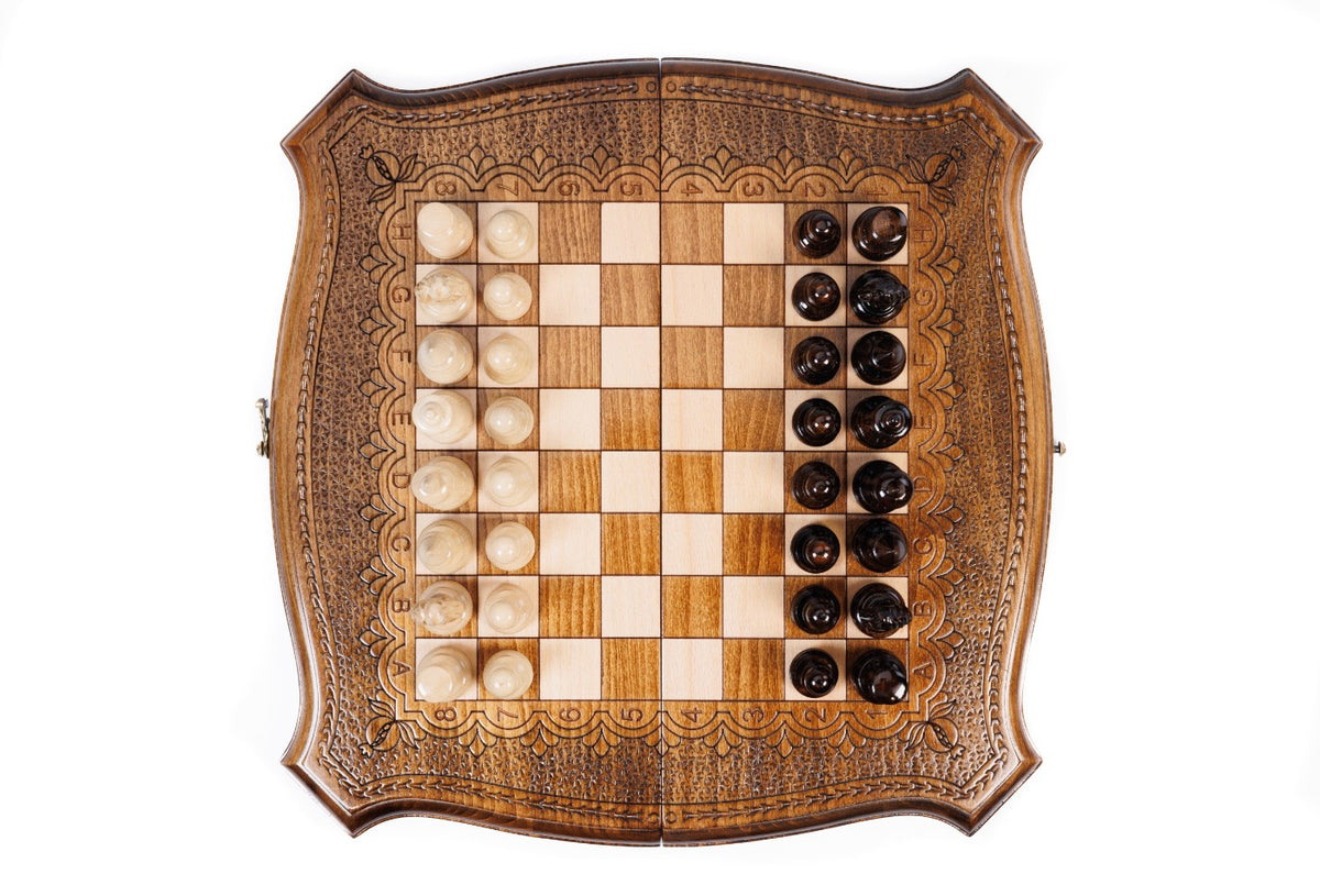 Top-down view of the contour outline chess set with all 32 pieces in starting position