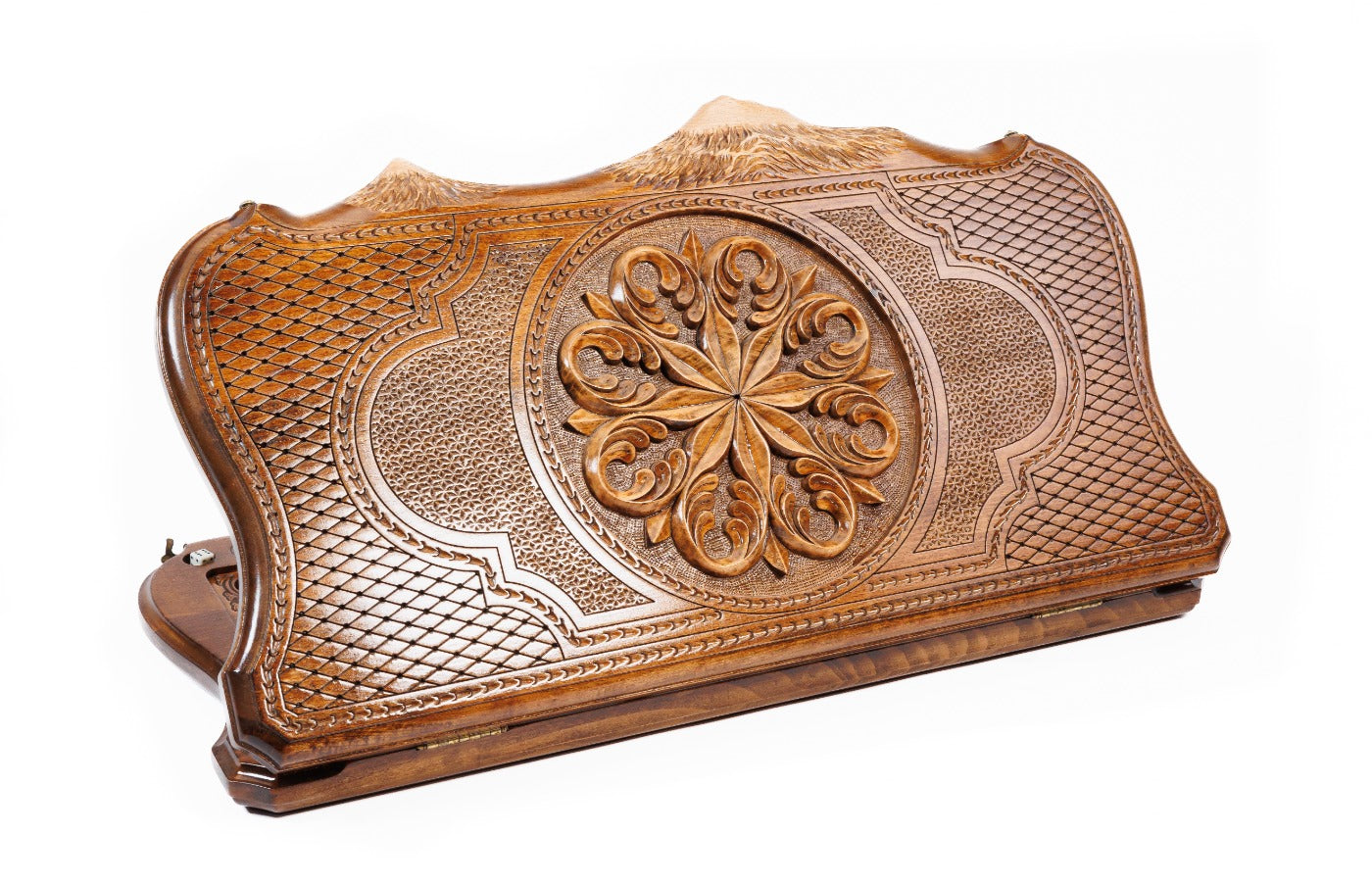 A bird's-eye view of the closed wooden backgammon board highlighting the symmetry of the ornamental patterns and the Mount Ararat outline.