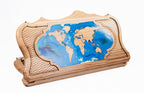A frontal shot of the closed World Map backgammon board featuring blue epoxy resin oceans and the copyrighted Mount Ararat outline.