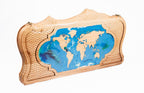 The interior view of the open Hrachya Ohanyan World Map set highlighting the smooth wood finish and professional playing lanes.
