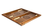 Walnut chess and backgammon set opened to the epoxy-finished backgammon field with wheel ornaments