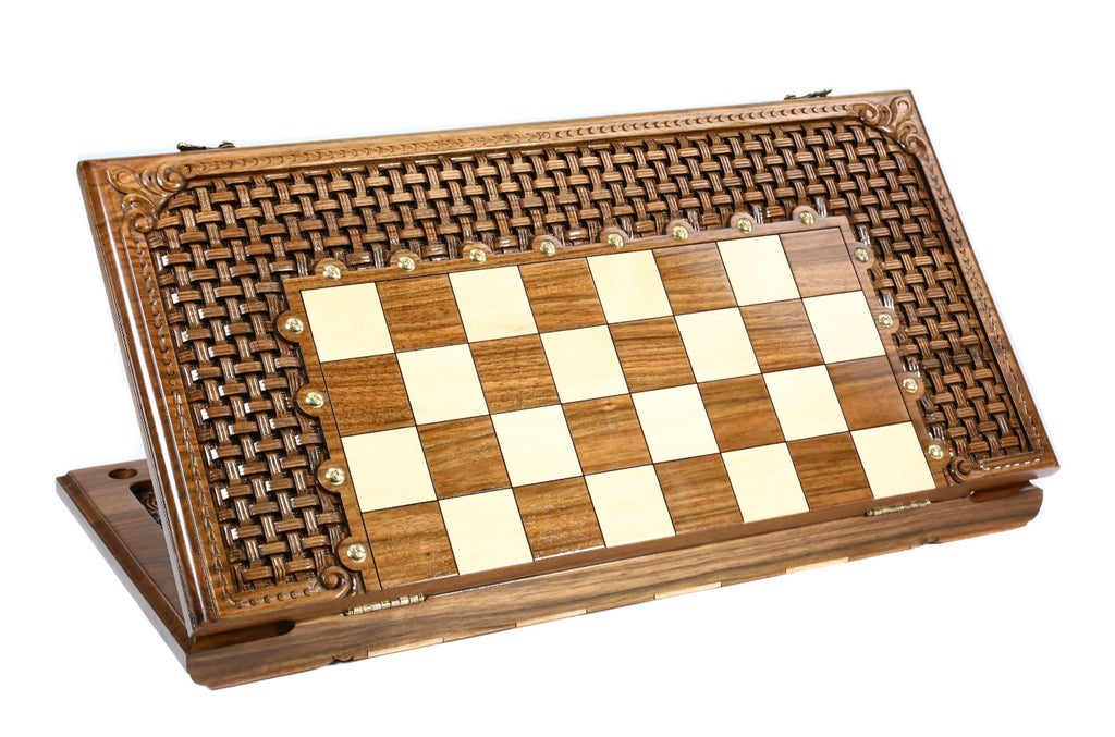 Closed 60 cm walnut chess board standing on edge, open-cut braid carving and bronze studs