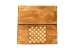 Classic backgammon board - playing pieces and dice arranged on the board