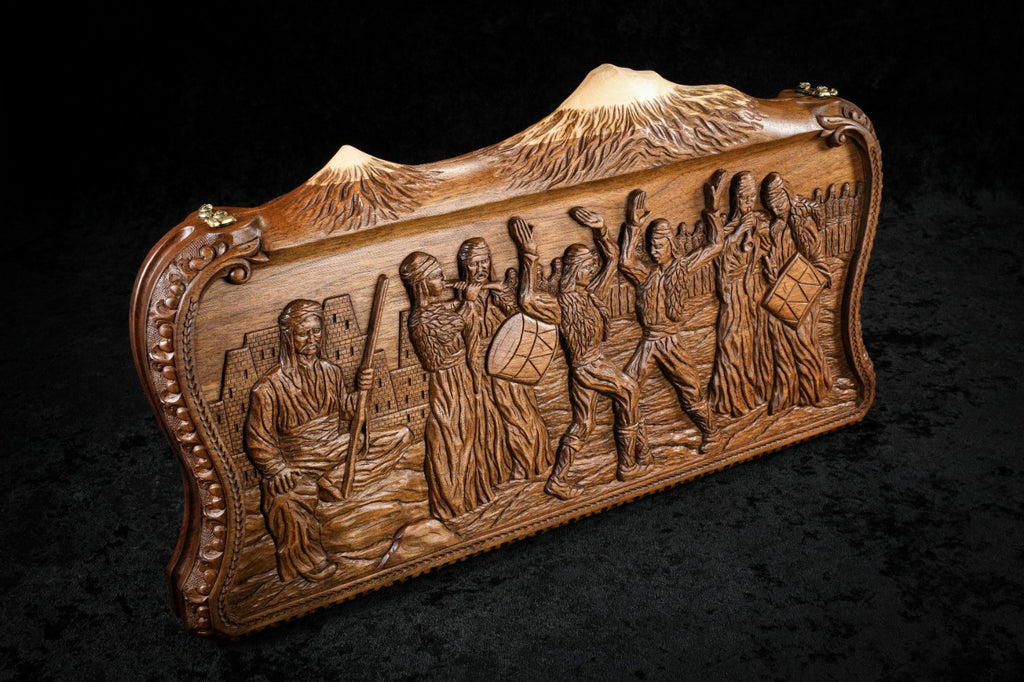 Wooden plaque with carved relief of people and landscape on a dark background