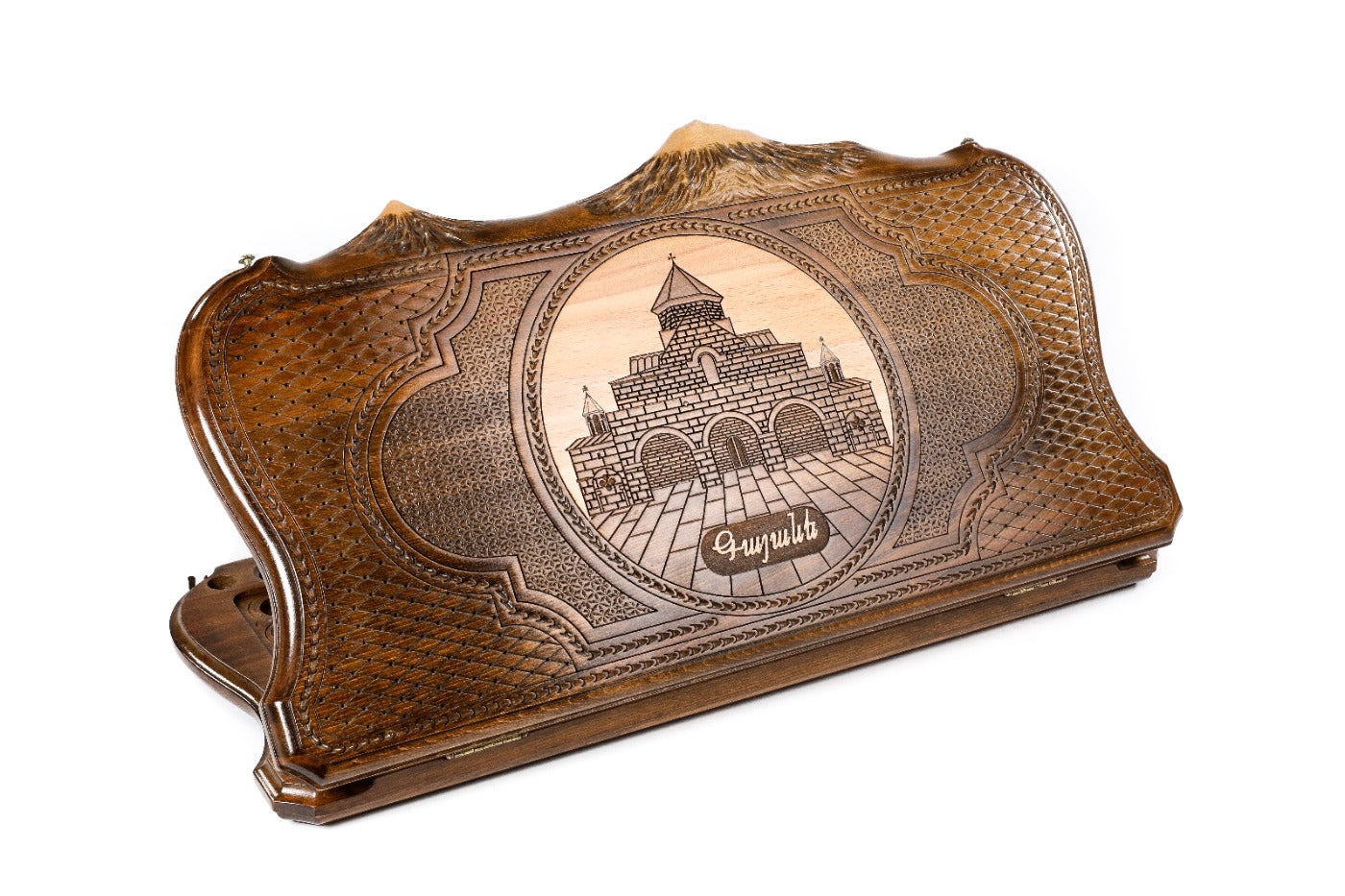 Side-by-side view of the closed wooden backgammon case showing the St. Gayane Church carving and the Mount Ararat silhouette.