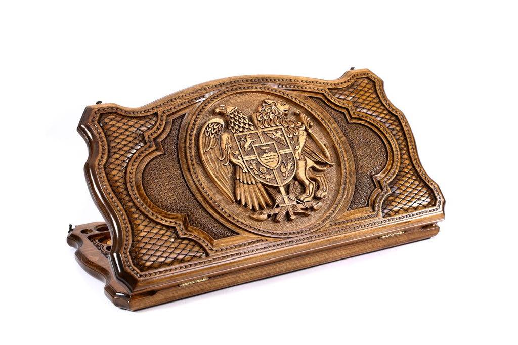 A frontal shot of the closed backgammon board showcasing the Armenian Coat of Arms carved within the copyrighted Mount Ararat outline.