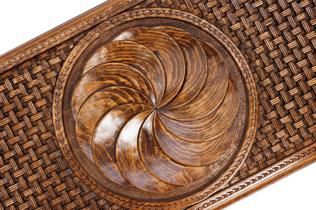 The interior of the open backgammon set showing the natural wood grain and the professional-grade playing pips.