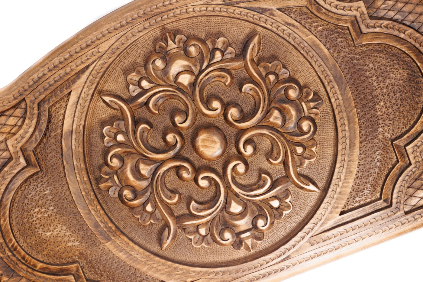 The interior of the open Hrachya Ohanyan ornamental set showing the rich wood grain and the professional-grade playing surface.