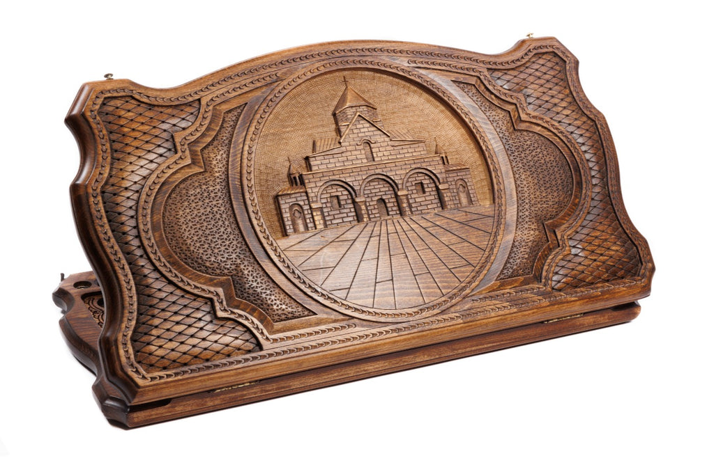 A frontal shot of the closed backgammon board featuring the St. Gayane Church carving within the copyrighted Mount Ararat outline.