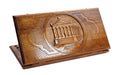 A frontal shot of the closed wooden backgammon case displaying the detailed colonnaded carving of the Garni Temple.