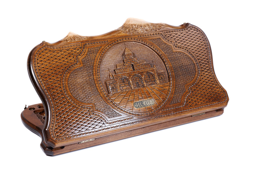 A frontal shot of the closed wooden backgammon board showcasing the intricate St. Gayane Church engraving and the Mount Ararat silhouette.