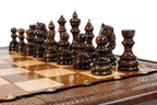 Carved chess and backgammon set - angled view showing the craftsmanship
