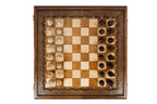 Carved chess and backgammon set - close-up of hand-carved chess pieces
