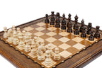 Handcrafted wooden chess board and backgammon set with hand-carved stippled texture and scalloped frame detail