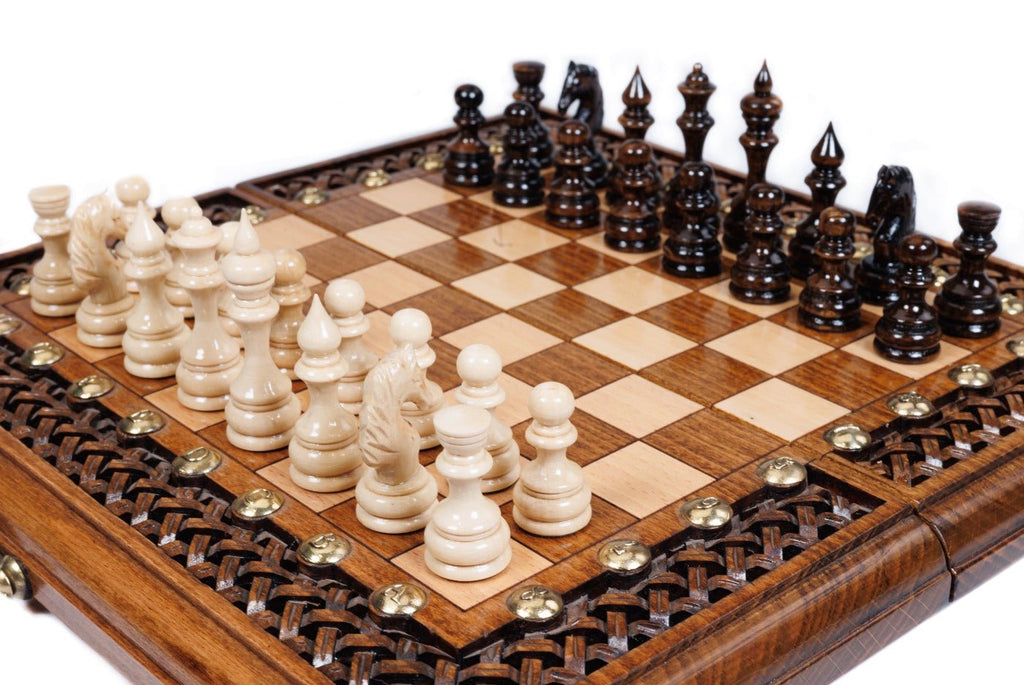 Handcrafted wooden chess board and backgammon set with full-border lattice braid carving and brass stud detailing