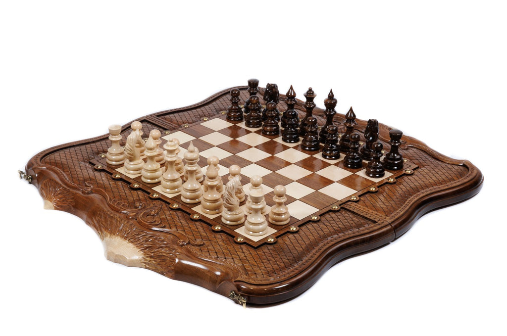 Luxury walnut chess and backgammon set cut in the Mount Ararat outline with carved braid frame, pieces set for play