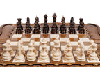 Front view of the luxury walnut chess set with all 32 hand-carved pieces in starting position
