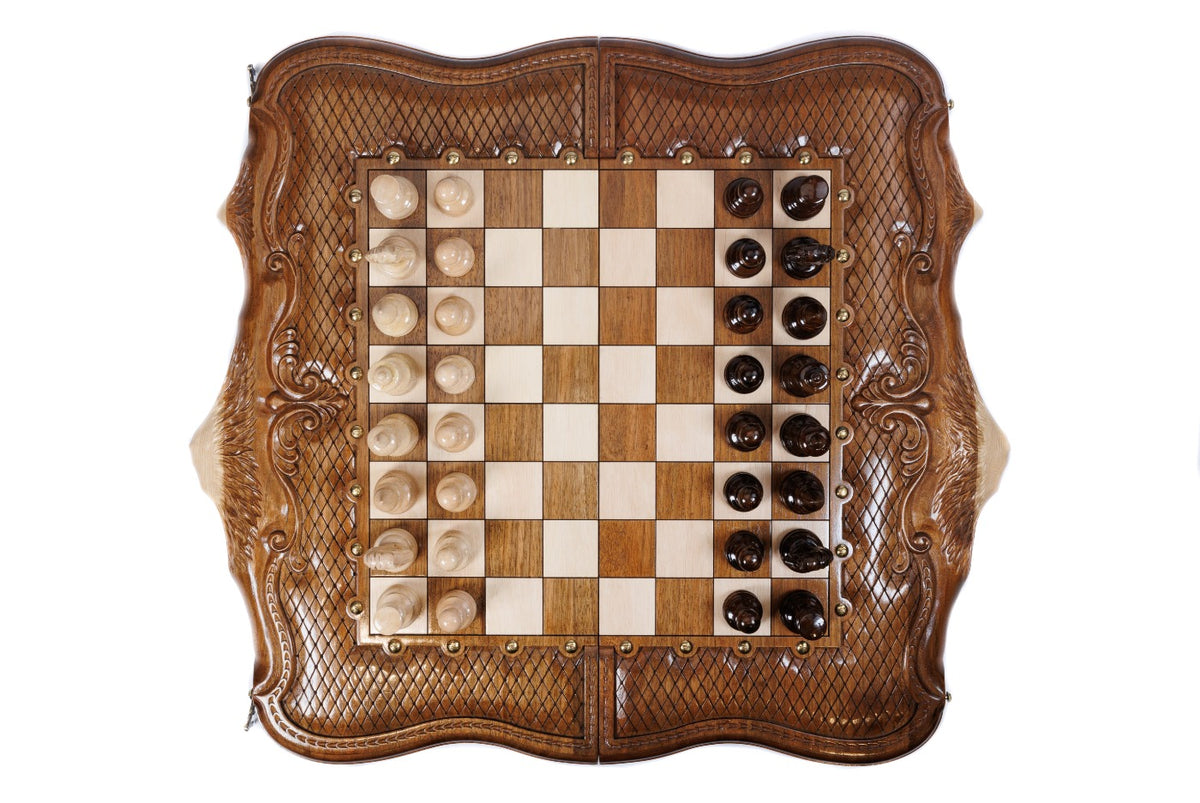Top-down view of the Ararat outline walnut chess set with pieces in position