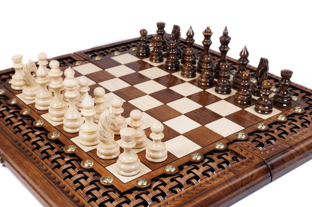 Handcrafted walnut chess board and backgammon set with lattice braid border and hand-carved floral corner details