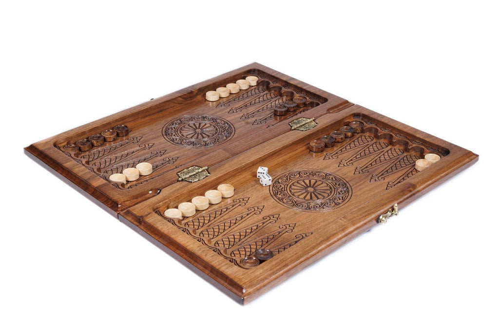 Solid walnut chess and backgammon set with open lattice carved border, bas-relief floral corners and brass stud accents