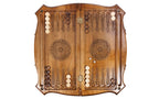 Ornamental Carved chess and backgammon set - close-up of hand-carved chess pieces
