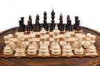 Carved Circular chess set - close-up of hand-carved chess pieces