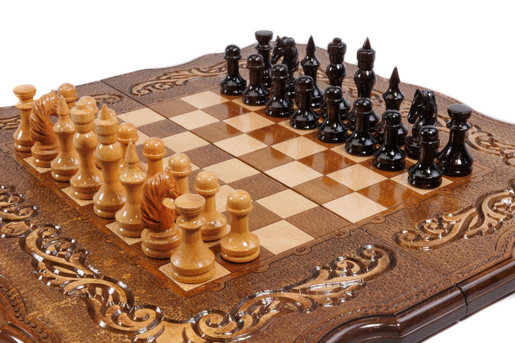 Large chess board with carved ornamental detailing and handcrafted design