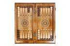 Classic Carved Ornament chess and backgammon set - close-up of hand-carved chess pieces