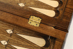 Classic backgammon board - playing pieces and dice arranged on the board
