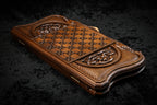 Back cover from above: carved basket-weave chequerboard and scroll ornament cartouches