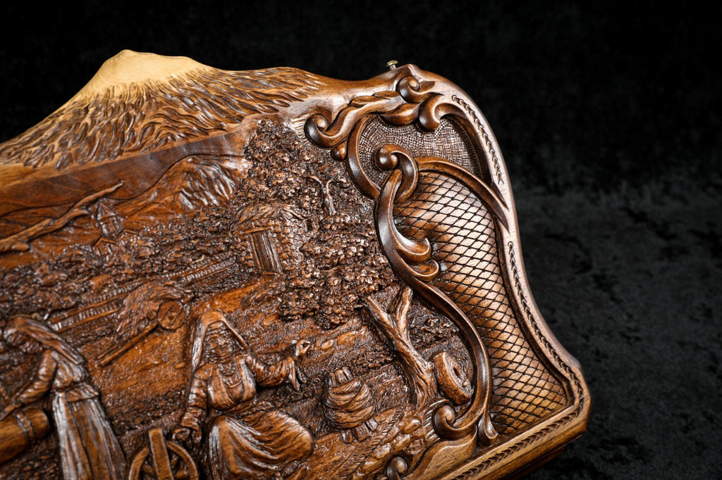 Corner of the lid: rococo scroll, faceted lattice and the carved slope of the Ararat peaks