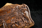 Corner of the lid: rococo scroll, faceted lattice and the carved slope of the Ararat peaks