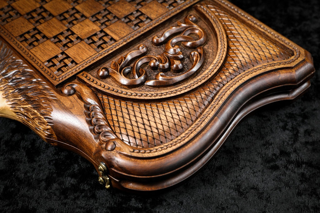 Scroll ornament in deep relief beside the basket-weave chequerboard on the back cover