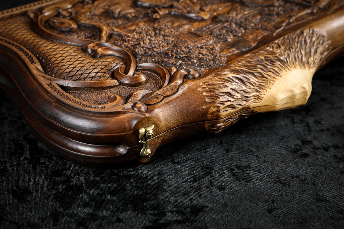 Carved Ararat peak at the corner of the lid with the scroll frame and cast-bronze clasp