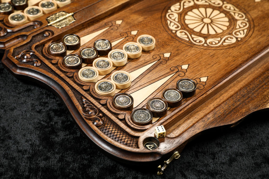 Ornament checkers with cast emblems on the hornbeam-inlaid points, wheel ornament beside them