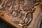 Village scene in deep relief with the scroll frame, seen from the side