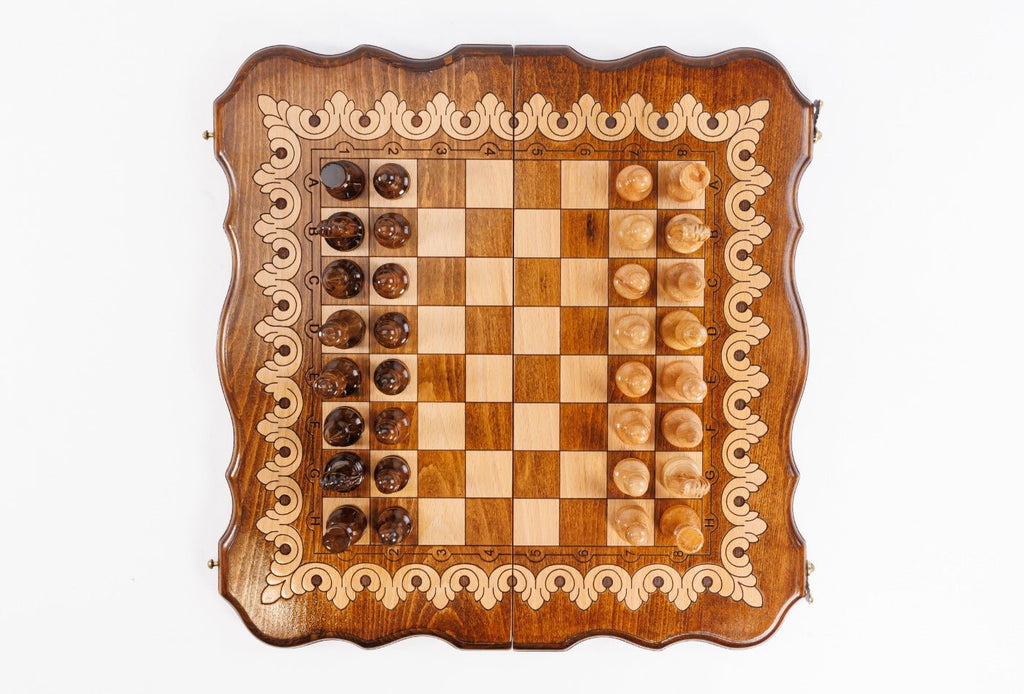 Wooden chessboard with checkers on a white background