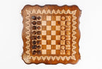 Wooden chessboard with checkers on a white background