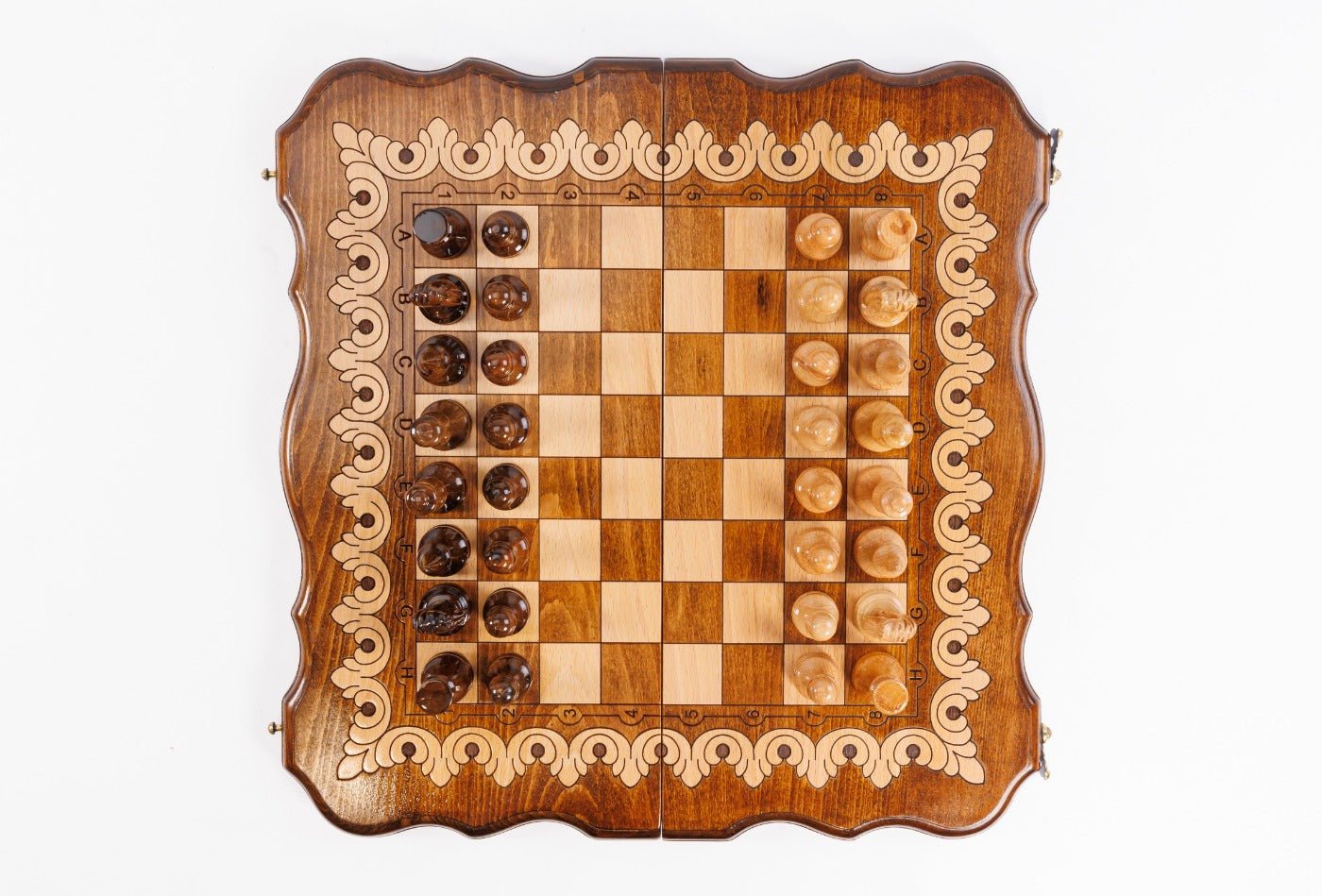 Wooden chessboard with checkers on a white background