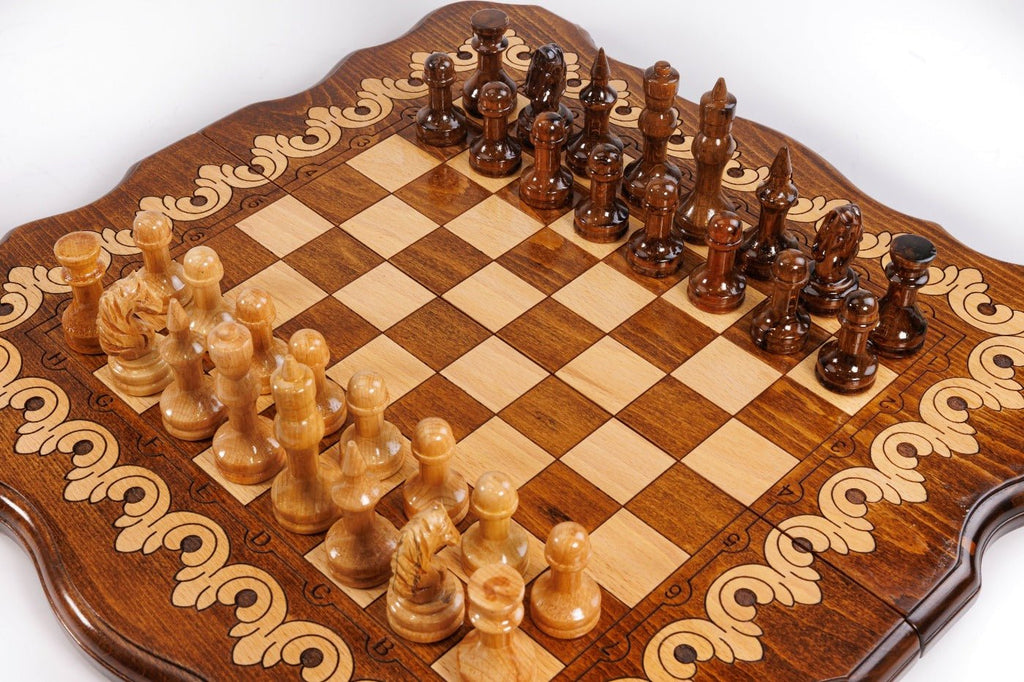 Wooden chess board featuring detailed carved ornament artwork and craftsmanship