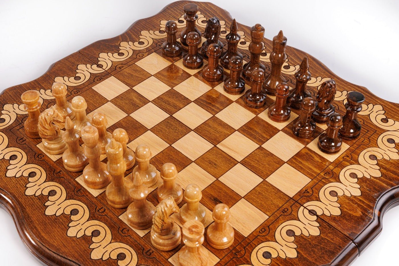 Wooden chess board featuring detailed carved ornament artwork and craftsmanship